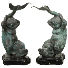 Pair of Bronze Putti on Dolphin Garden Statues