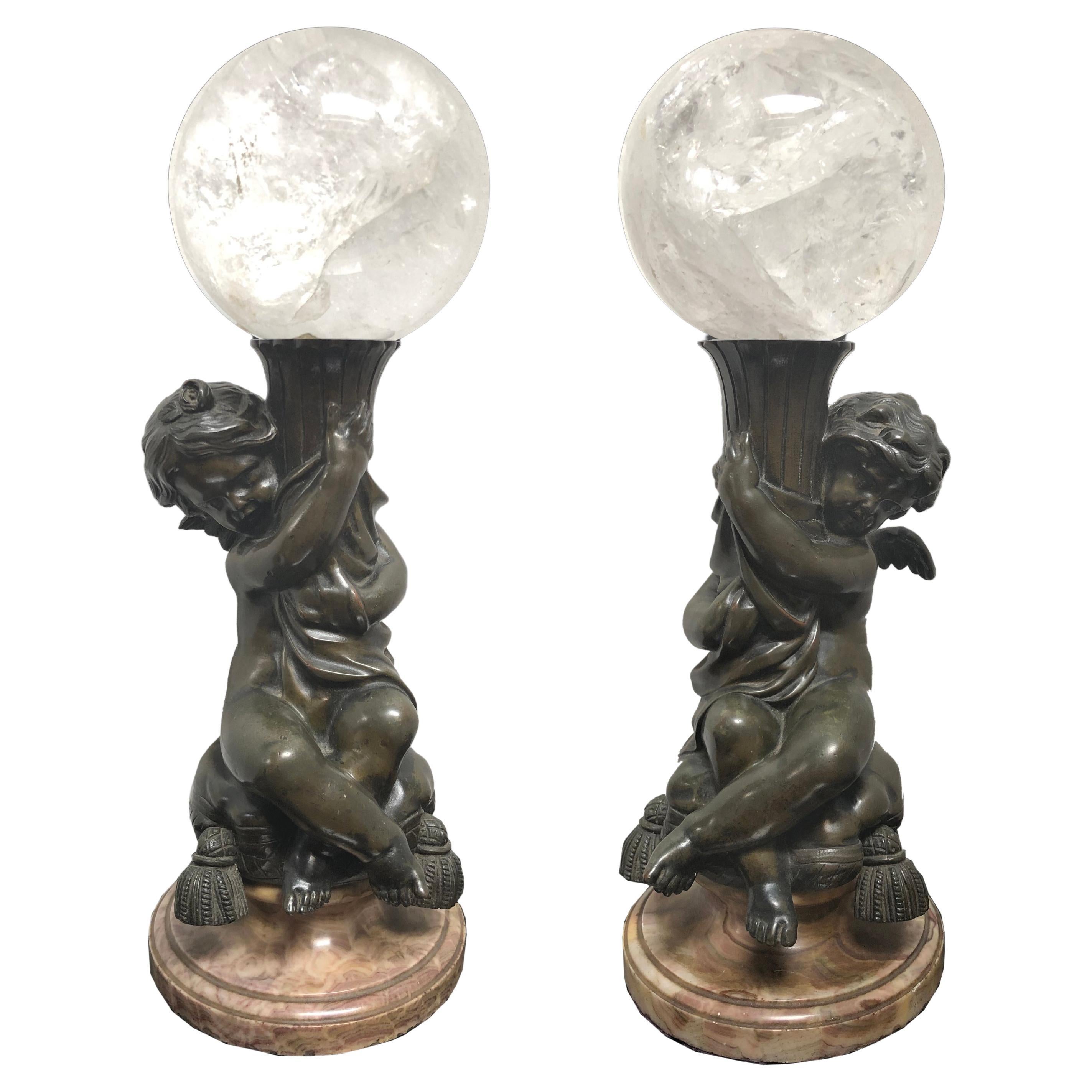 Pair of Bronze Putti  With Rock Crystal Spheres For Sale