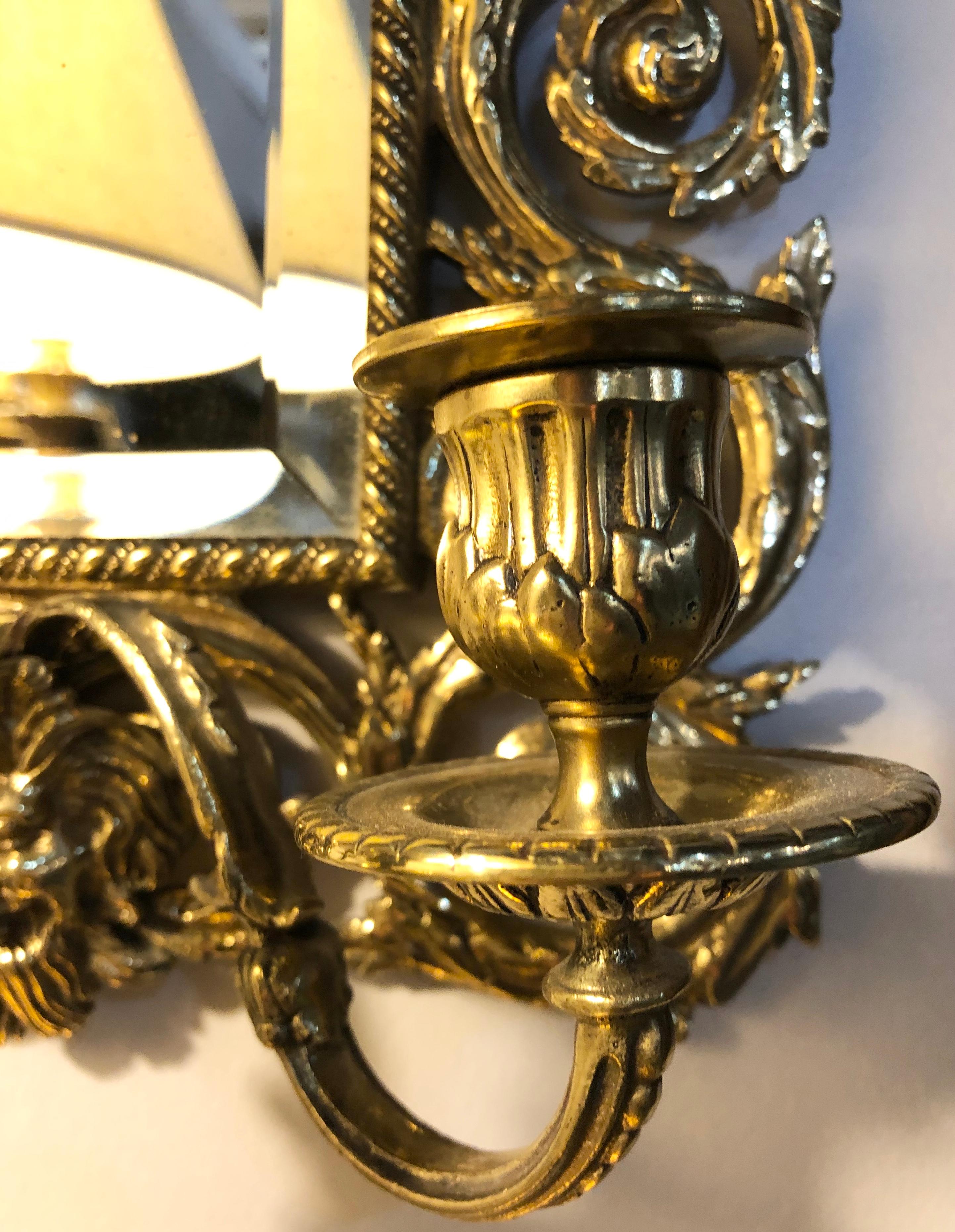 Pair of Bronze Rococo Three-Arm Mirror Wall Sconces In Good Condition In Stamford, CT