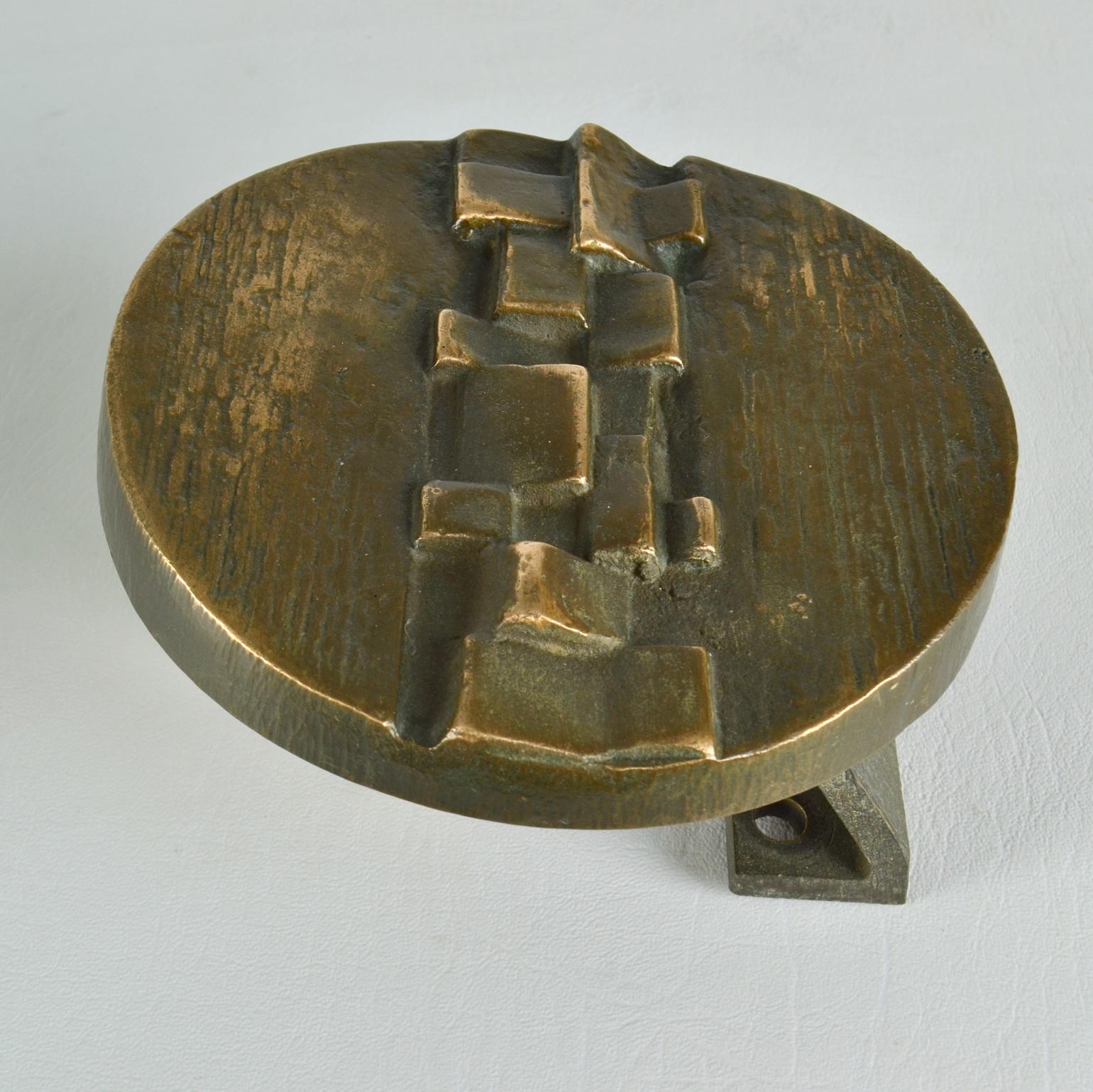 A set round push and pull door handles with strong vertical geometric relief are like door sculptures with original patinas, produced in the 1970's.
The identical handles to be applied on double doors together or on a single door on opposite sides.