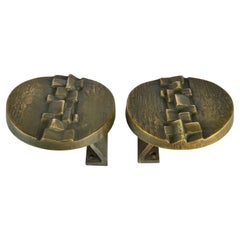 Coppia di maniglie per porte a pressione rotonde in bronzo architettoniche con rilievo geometrico