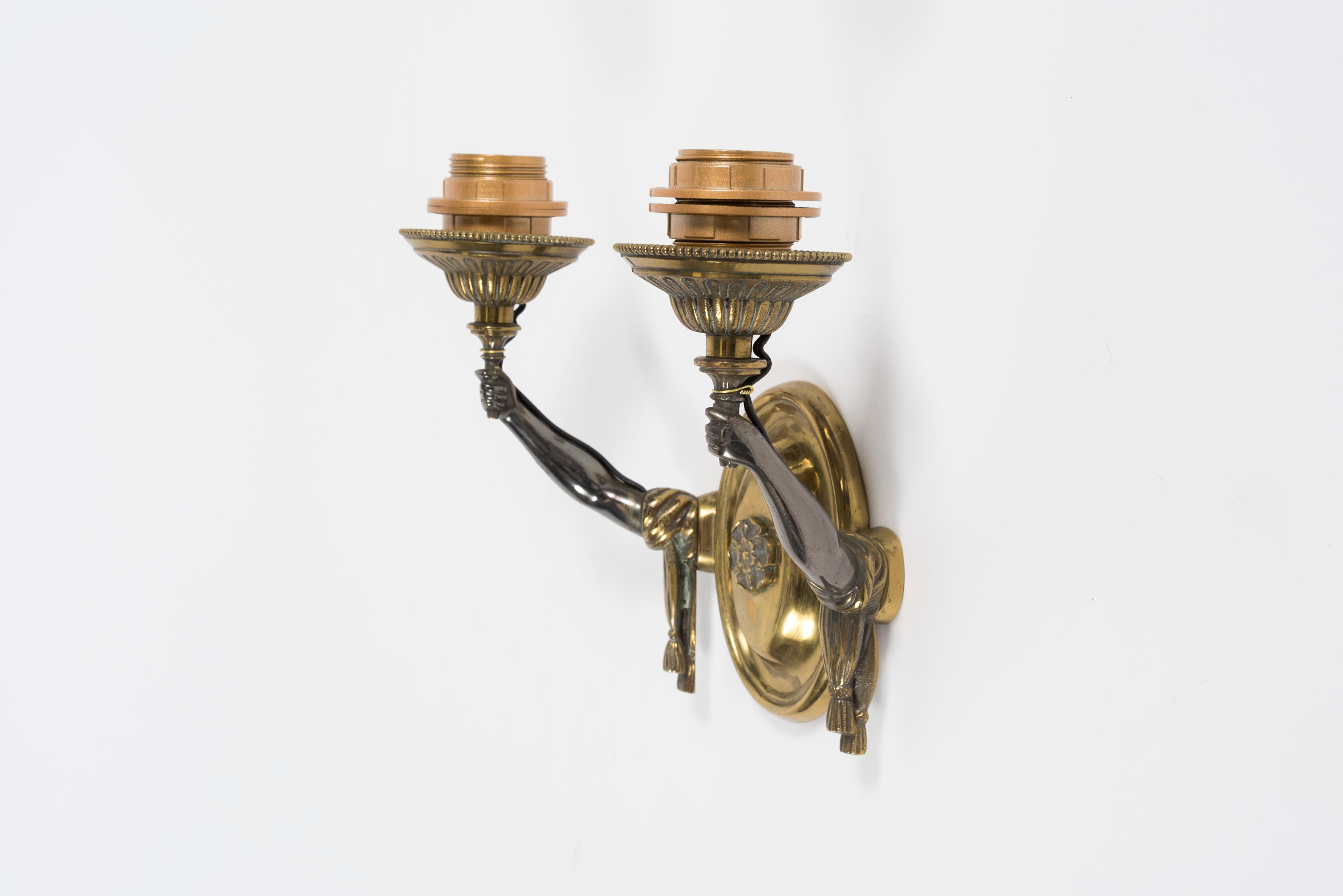 Pair of bronze sconces attributed to Maison Jansen
France
Good vintage condition
Rewired.