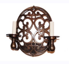Set of 8 Bronze Sconces. Sold per pair.