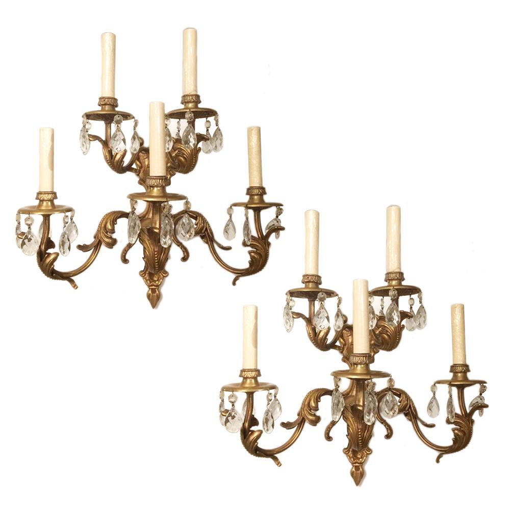 Pair of 1900's French bronze, five light sconces with crystal pendants.