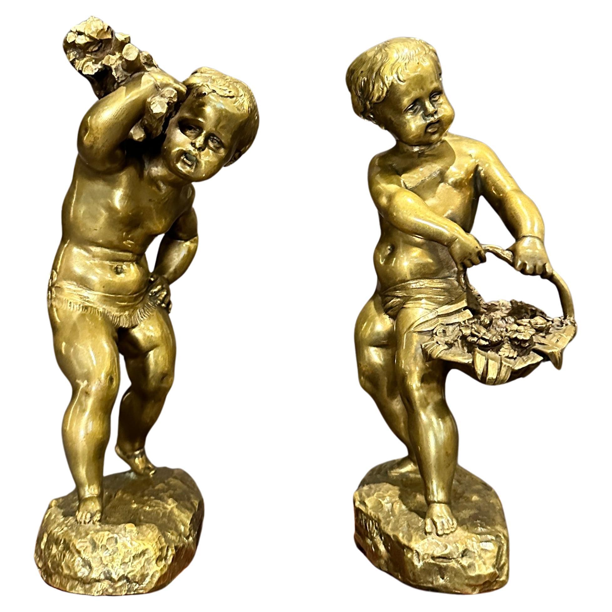 Paire de sculptures/ serre-livres en bronze d'Emile Laporte en vente