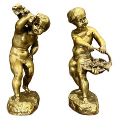 Paire de sculptures/ serre-livres en bronze d'Emile Laporte