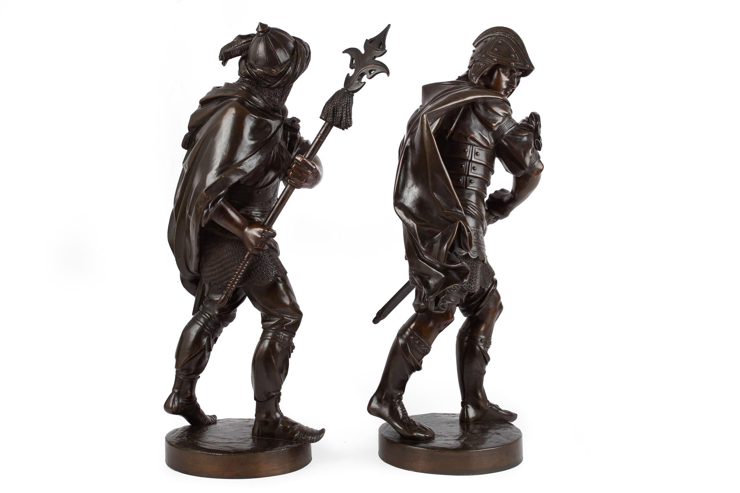A good pair of late 19th century bronze castings after the models of 16th century warriors by Albert Ernest Carrier-Belleuse. They are unsigned, but a known pair executed as part of Carrier-Belleuse's series of warriors ancient through modern. The