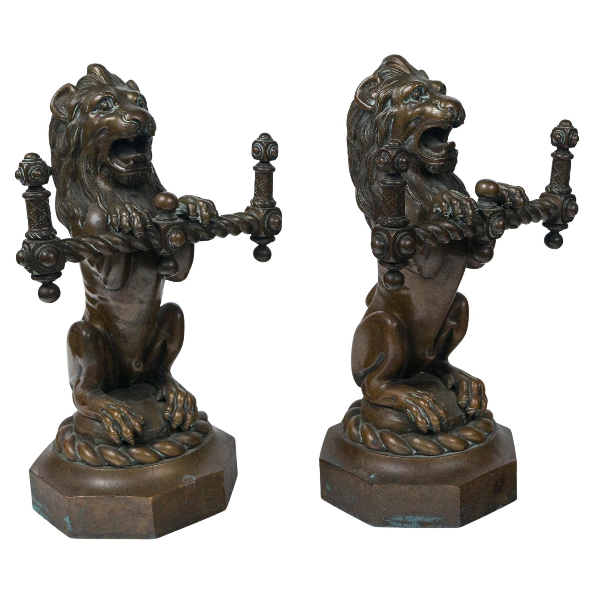 Pair of Bronze Seated Lions For Sale
