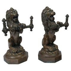 Pair of Bronze Seated Lions