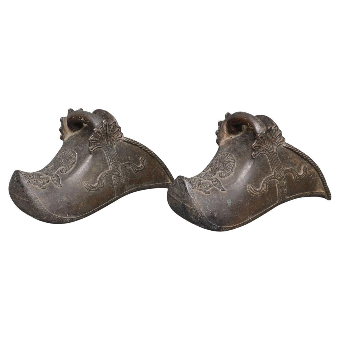 Pair of Bronze “Shoe-Shape" Conquistador Horse Stirrups with Low Relief Design For Sale