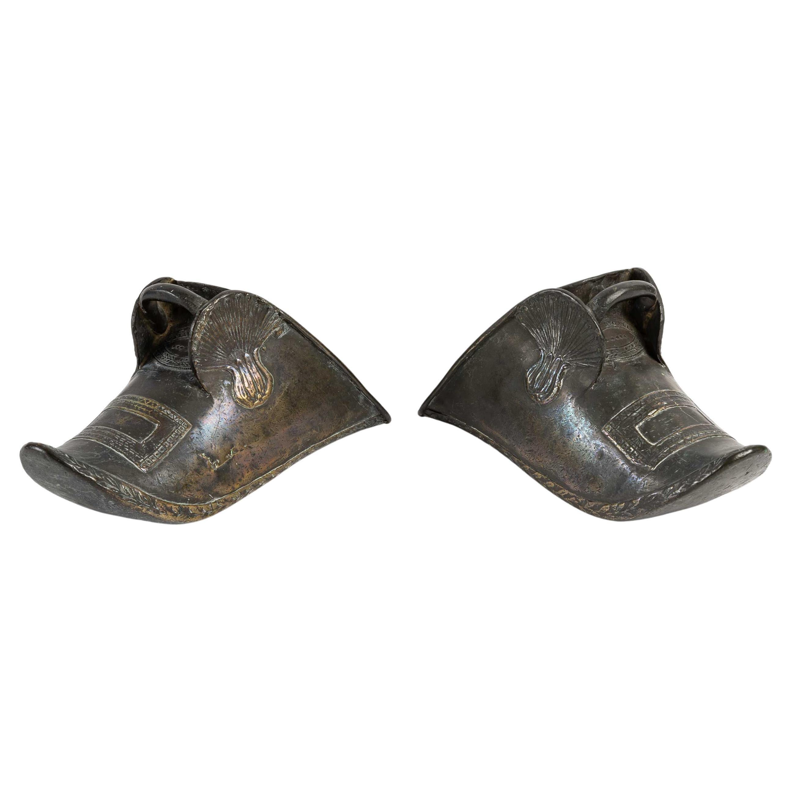 Pair of Bronze stirrups (Estribos), 19th century.
Measures: H: 14 cm, W: 29 cm, D: 11 cm.