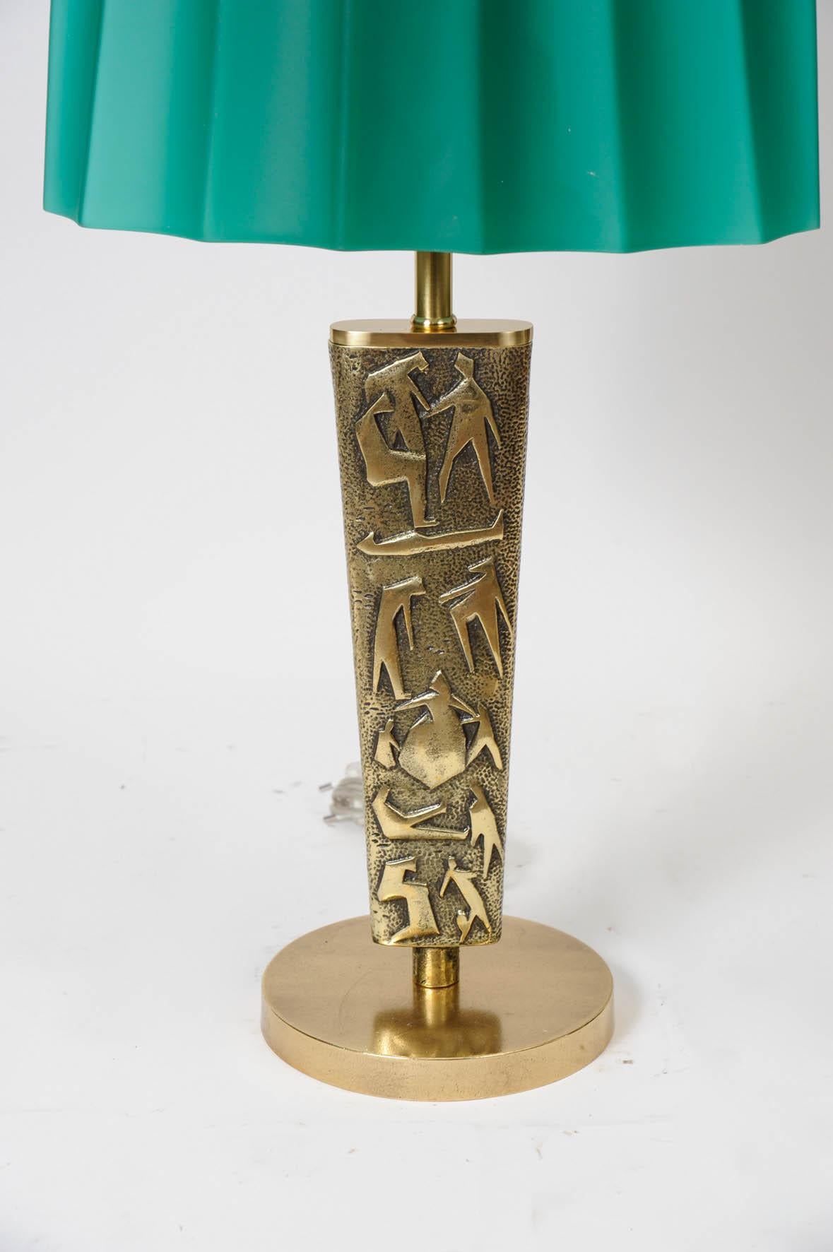 Bronze lamps with opaline shade.