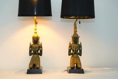 Pair of bronze Thai Teppanom kneeling Buddha table lamps. Hollywood Regency