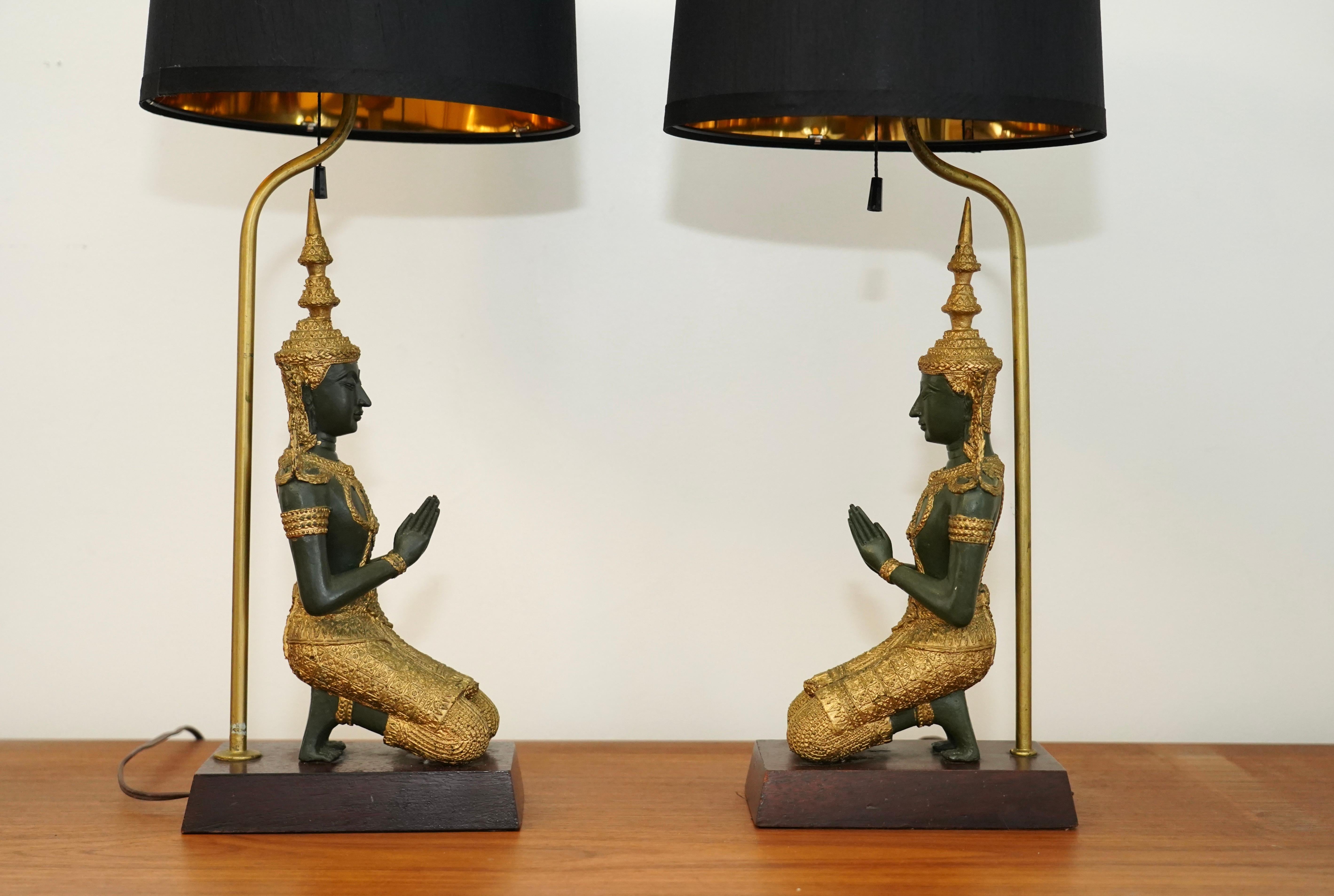 Mid-20th Century Pair of bronze Thai Teppanom kneeling Buddha table lamps. Hollywood Regency For Sale