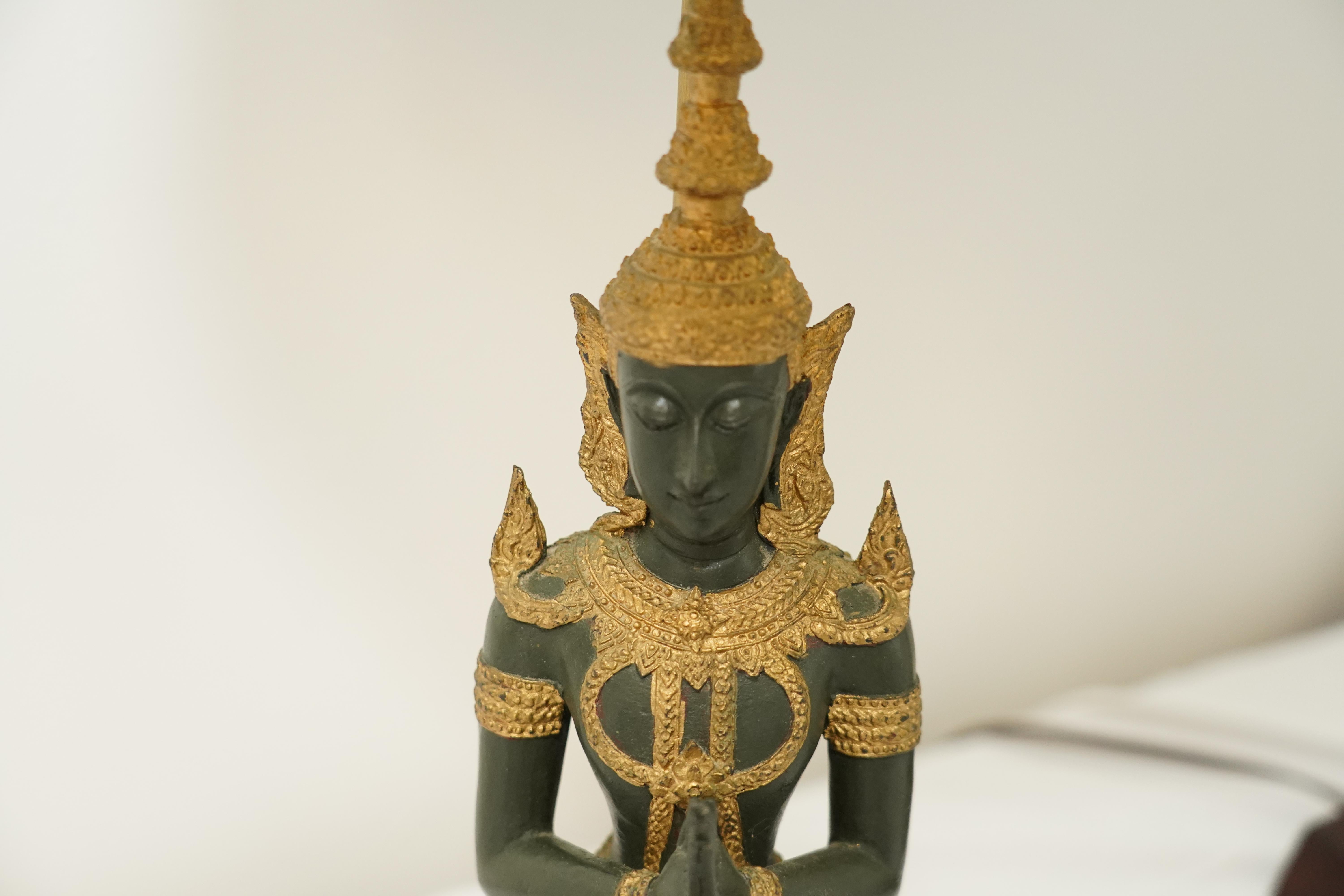 Bronze Pair of bronze Thai Teppanom kneeling Buddha table lamps. Hollywood Regency For Sale