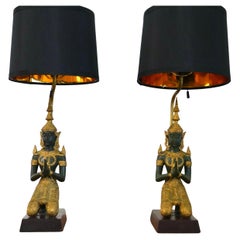 Pair of bronze Thai Teppanom kneeling Buddha table lamps. Hollywood Regency
