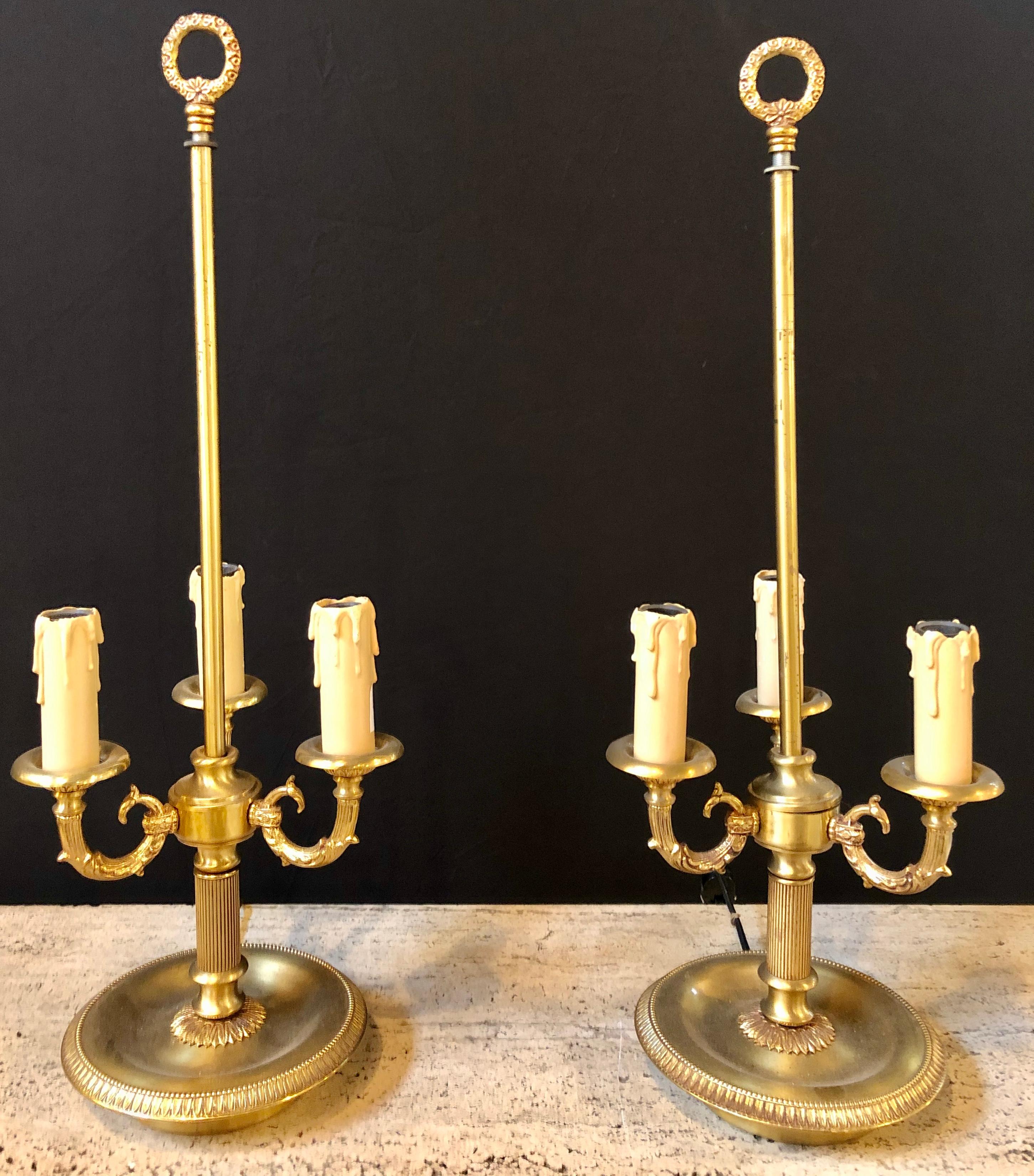 Pair of bronze three-arm bouiliotte lamps.
ISX.