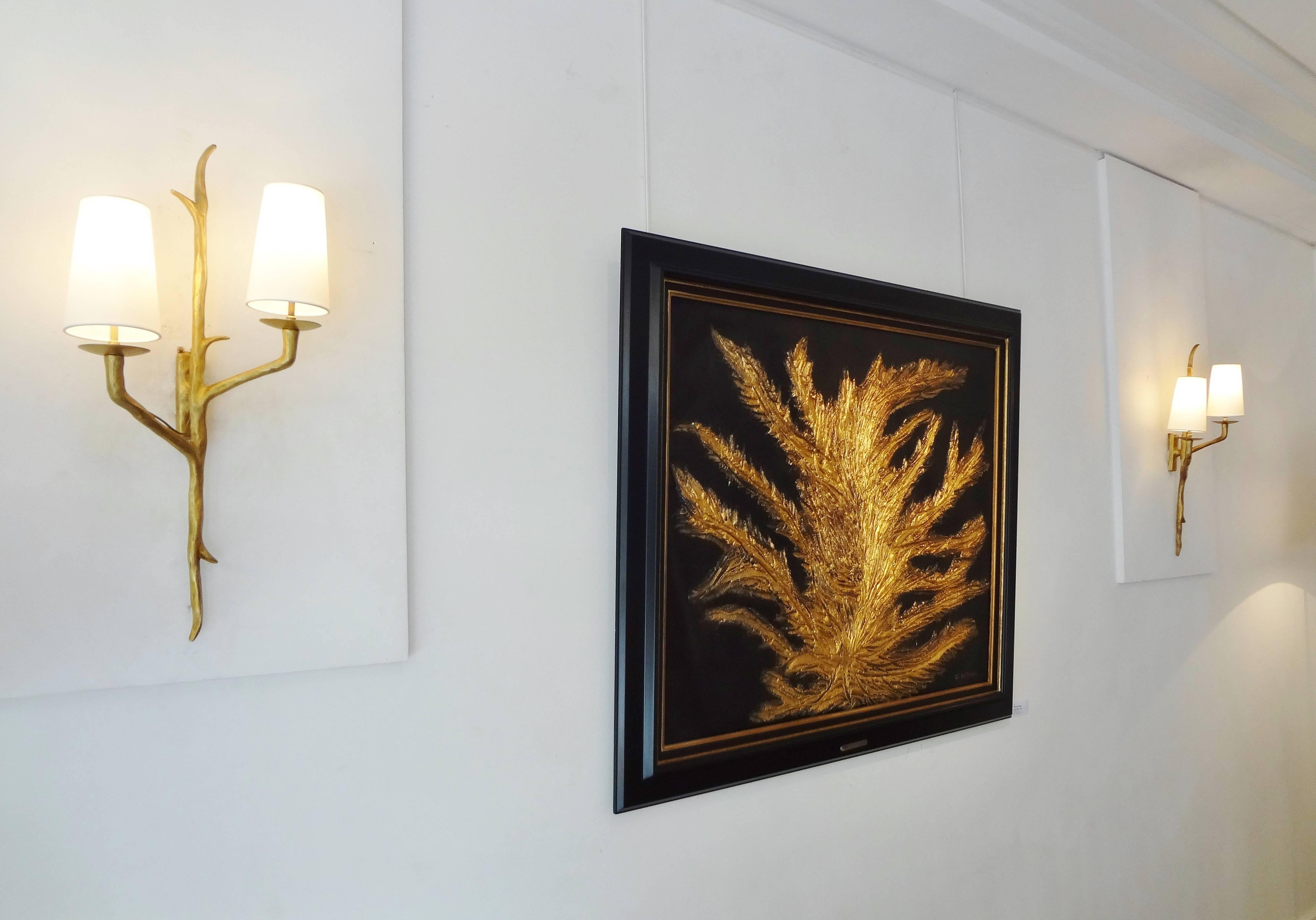 Pair of gilt patinated wall sconces by Maison Arlus, 1950s
as tree branches, with two lights each. 
White fabric conical shades.


