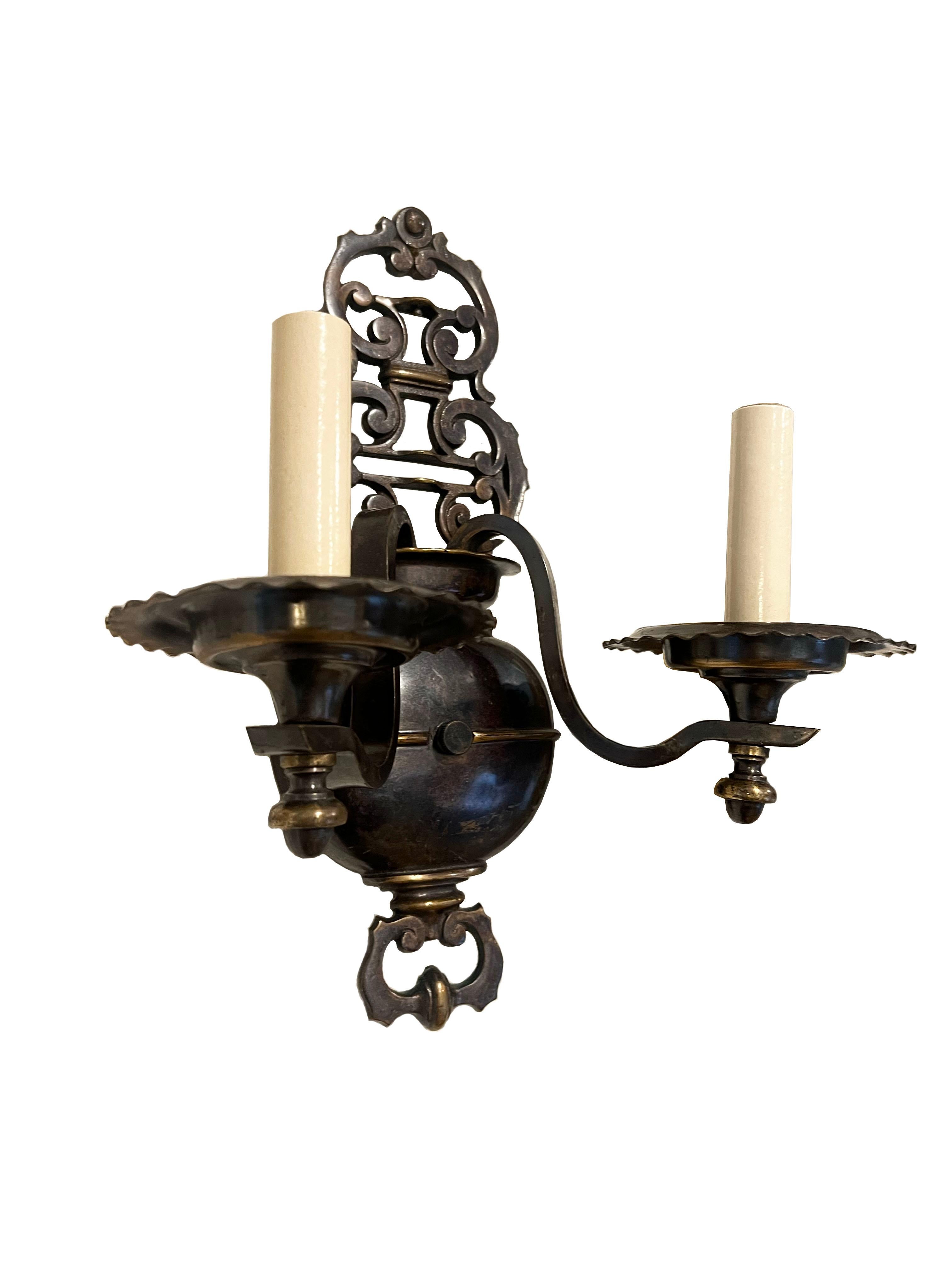 Mid-Century Modern Pair of Bronze Wall Sconces For Sale