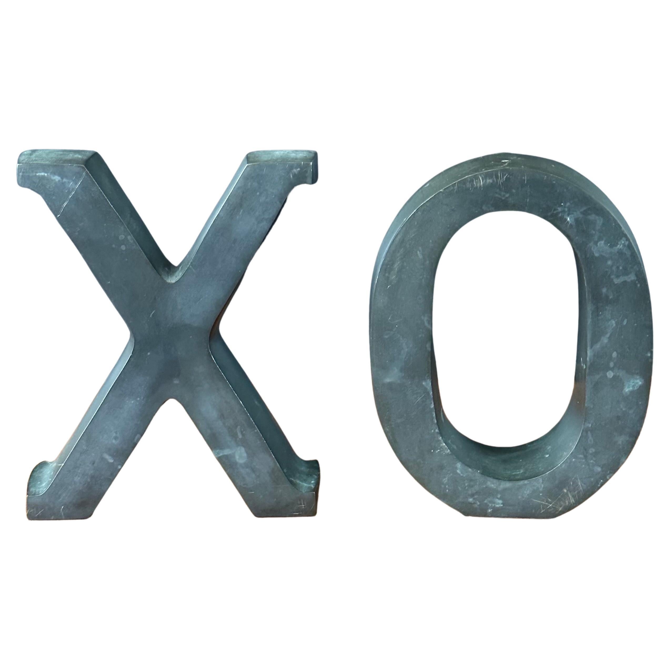 Pair of Bronze "X O" Bookends in the Style of Curtis Jere  For Sale