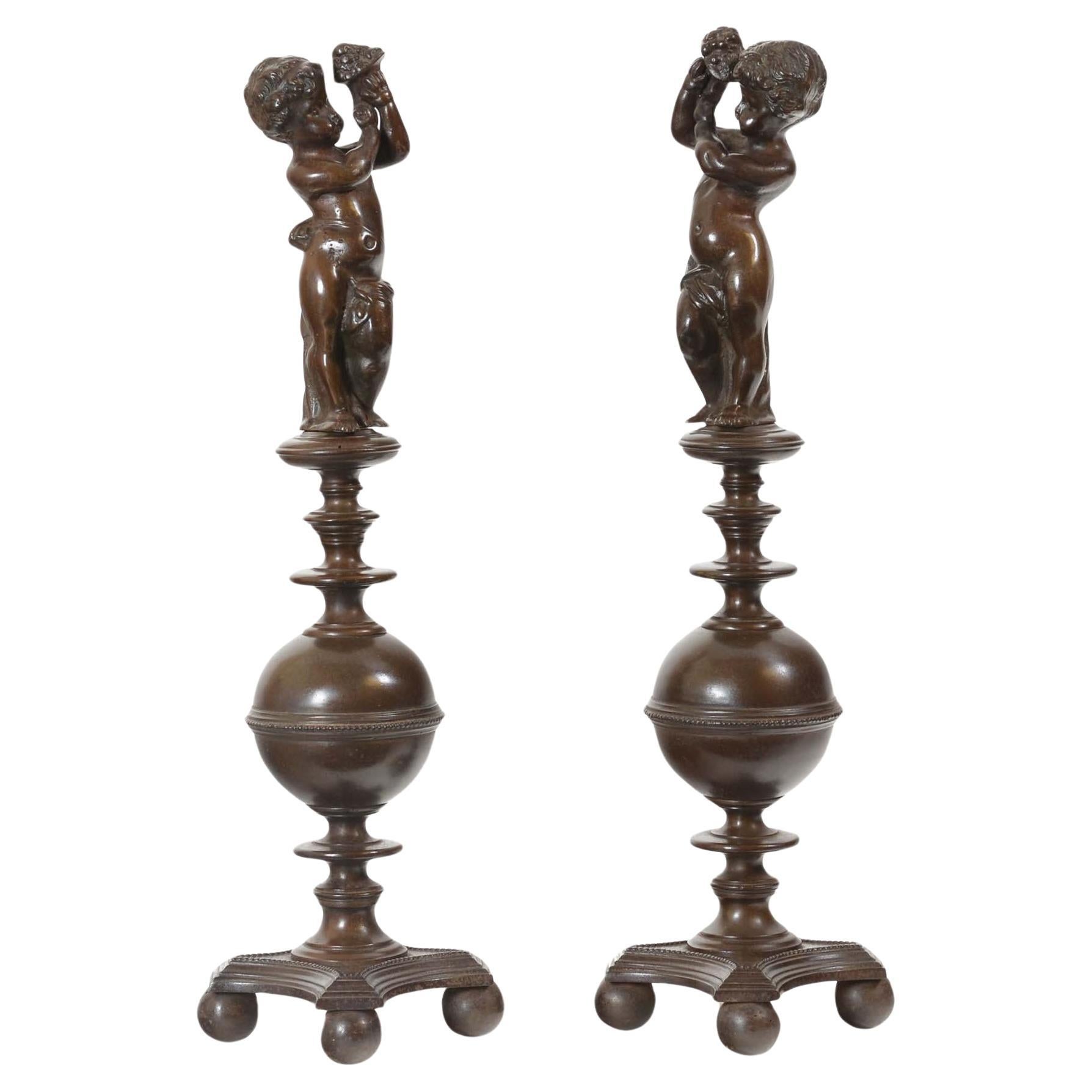 Pair of bronzed cast iron Italian Renaissance style fire andirons For Sale