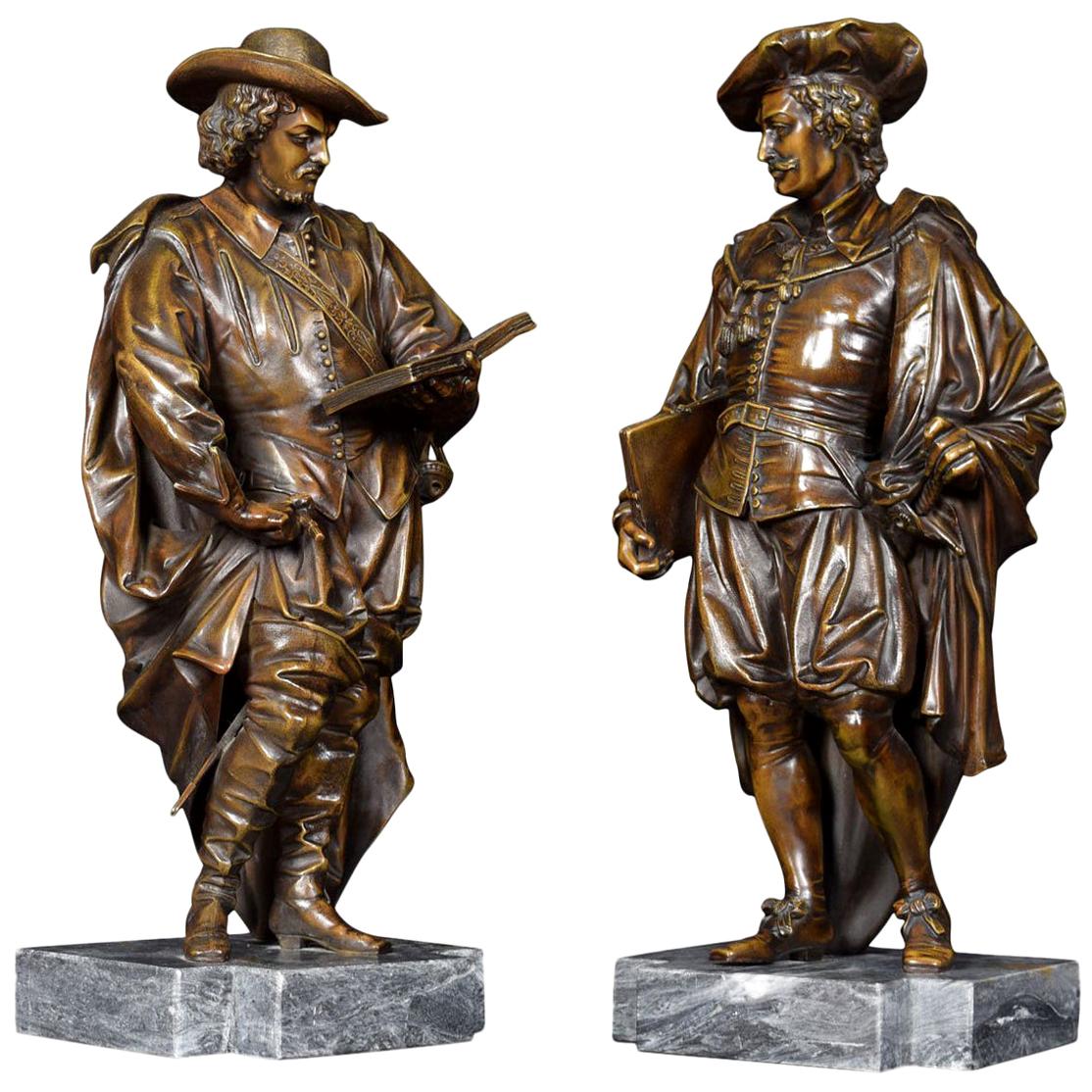 Pair of Bronzed Figures on Marble Bases