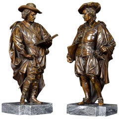 Pair of Bronzed Figures on Marble Bases