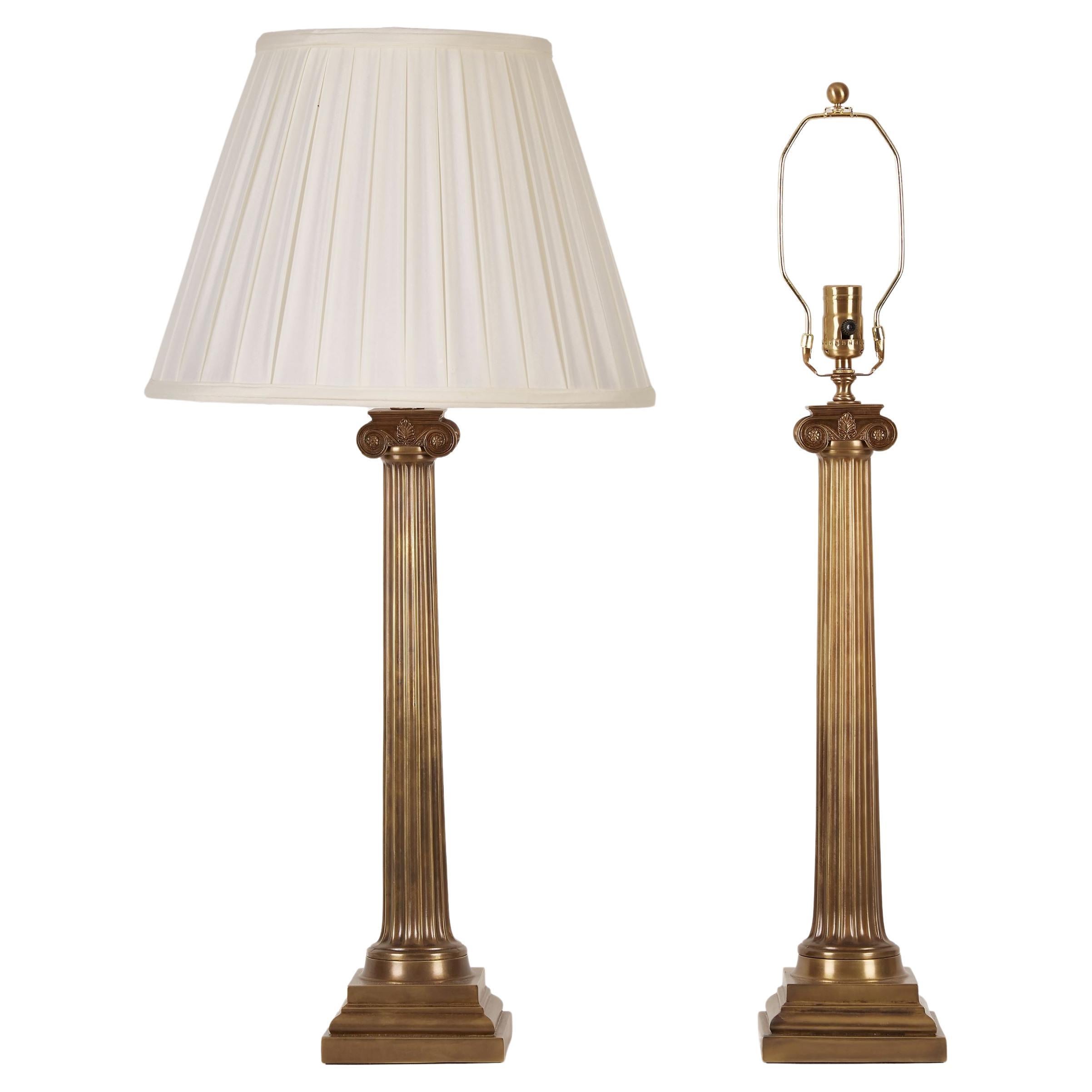 Pair of Bronzed Fluted Ionic Column Lamps 20th Century. Shades not included.