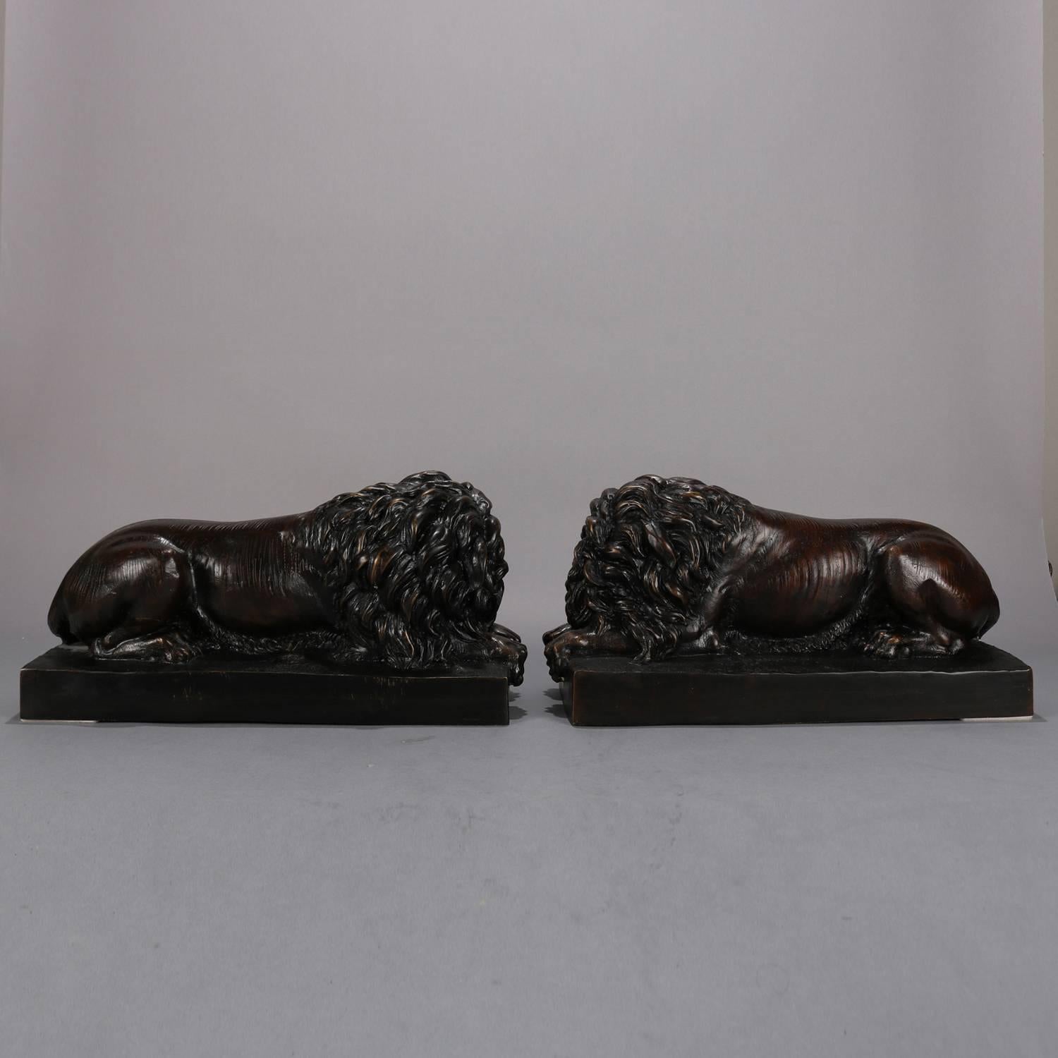 Pair of Bronzed Metal Sculptures of Recumbent African Lions, 20th Century In Excellent Condition In Big Flats, NY