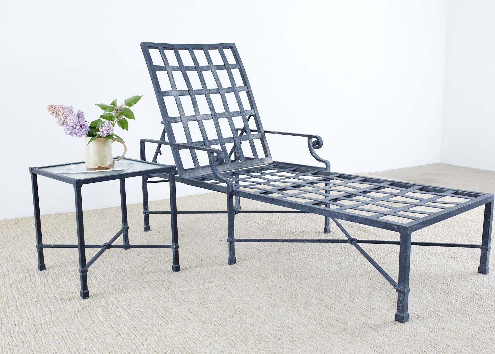 Stylish wrought aluminum patio and garden chaise lounges made by Brown Jordan. From the Neoclassical style Venetian collection featuring a lattice seat and adjustable back with decorative scrolled arms. The lounges have a powder coated multi step