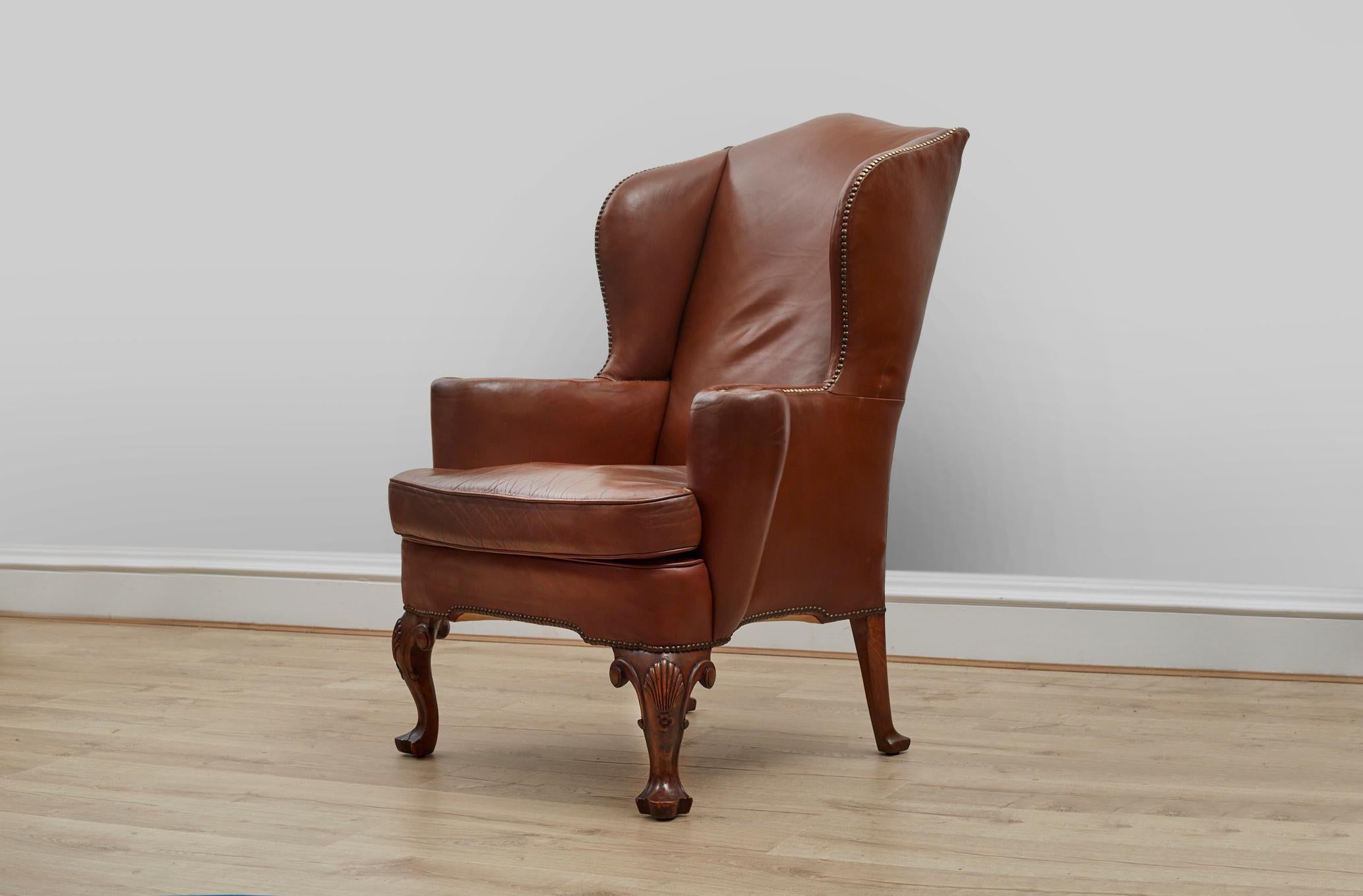 Pair of brown leather 1920s wingback chairs In Fair Condition In London, GB