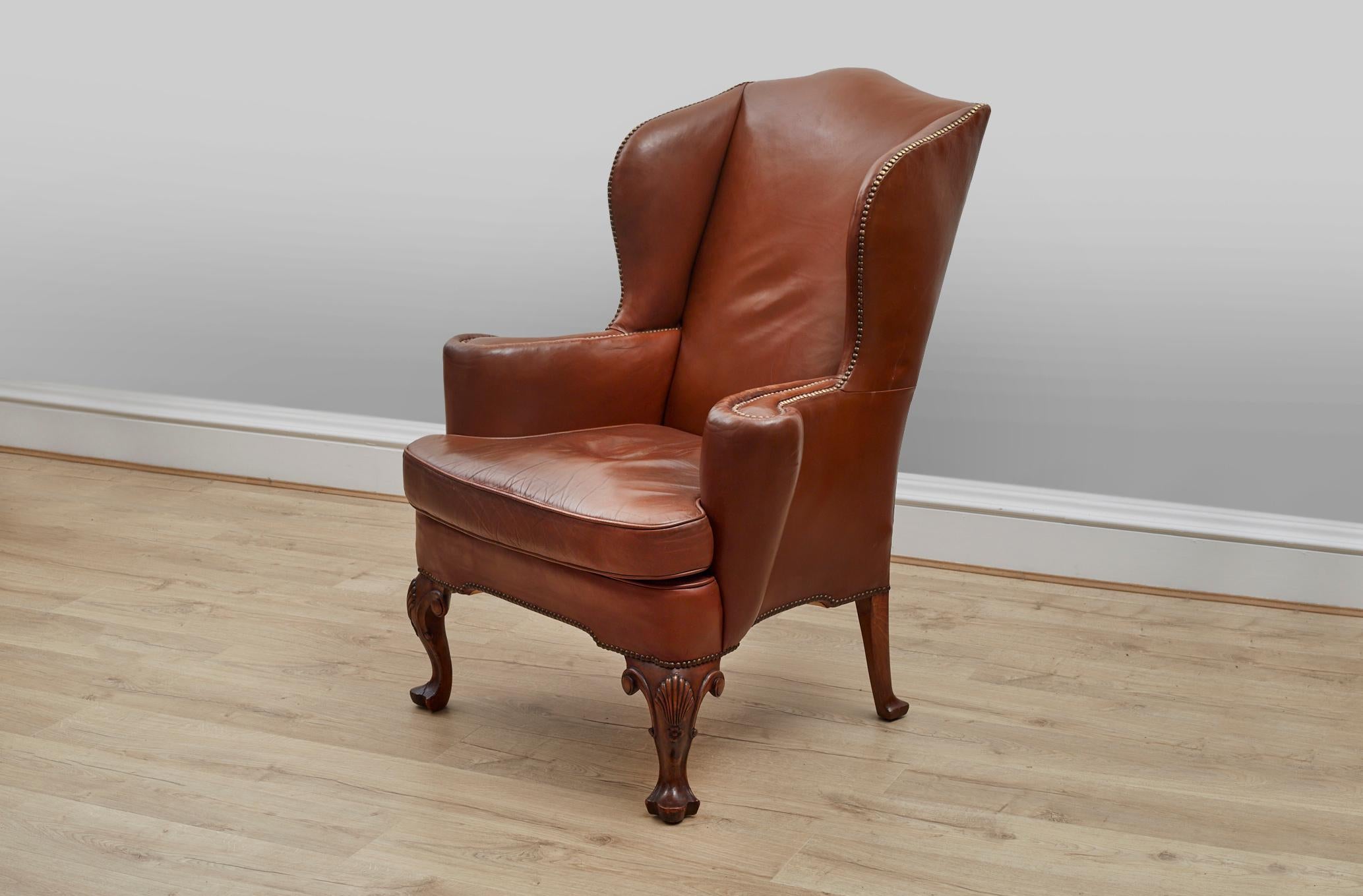 20th Century Pair of brown leather 1920s wingback chairs