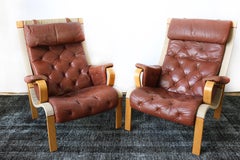 Pair of Brown Leather and Beechwood Lounge Chairs, circa 1960s