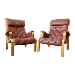 Pair of Brown Leather and Beechwood Lounge Chairs, circa 1960s