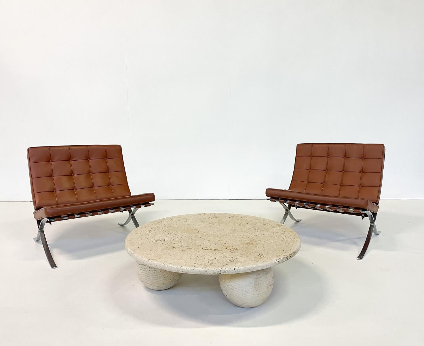 Pair of brown leather barcelona chairs by Mies Van Der Rohe for Knoll.