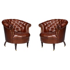 Pair of Brown Leather Barrel Back Chairs