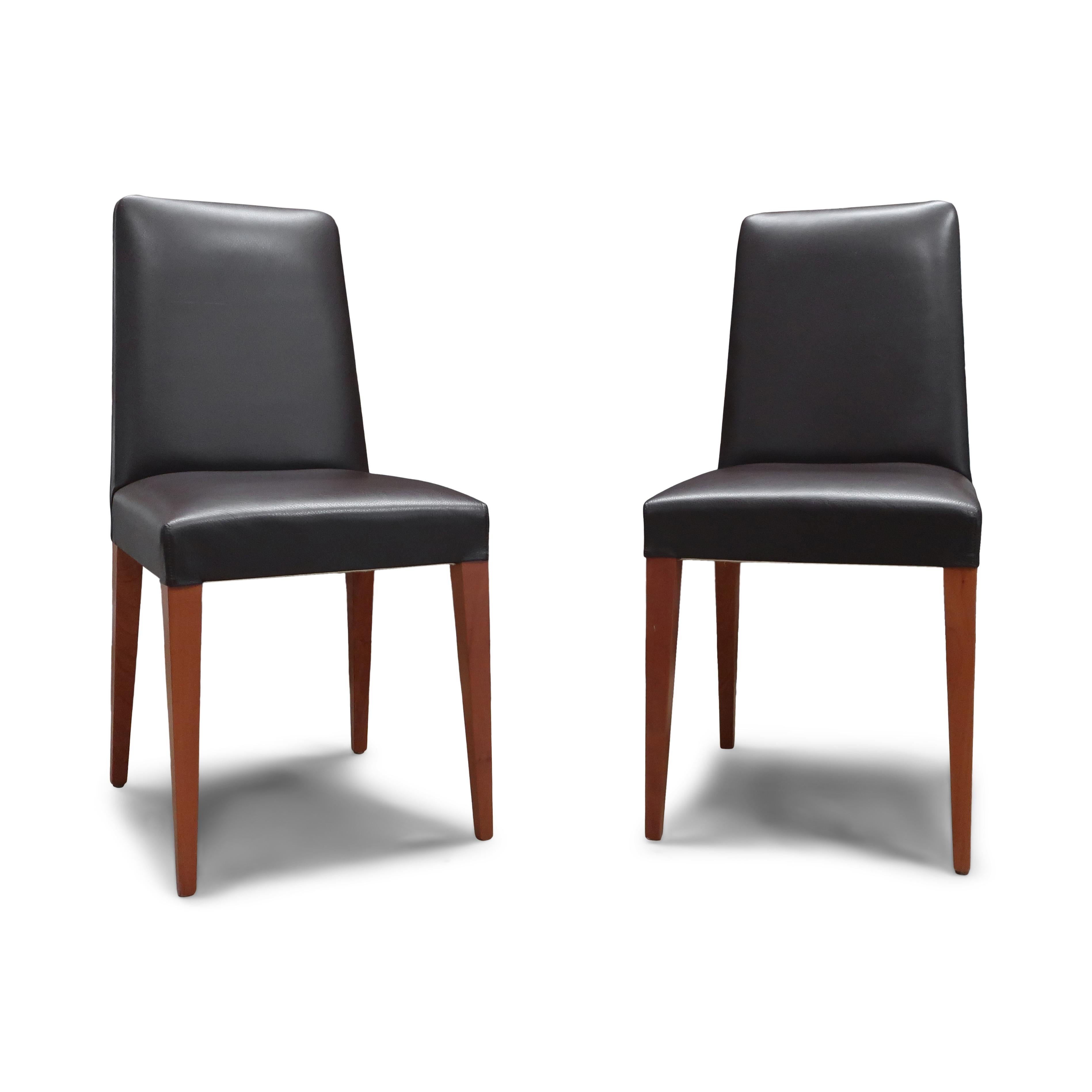 As its name itself suggests, this pair of chairs are one of Ceccotti Collezioni's timeless classics. Designed by the company's celebrated artistic director Roberto Lazzeroni in 2001, the 