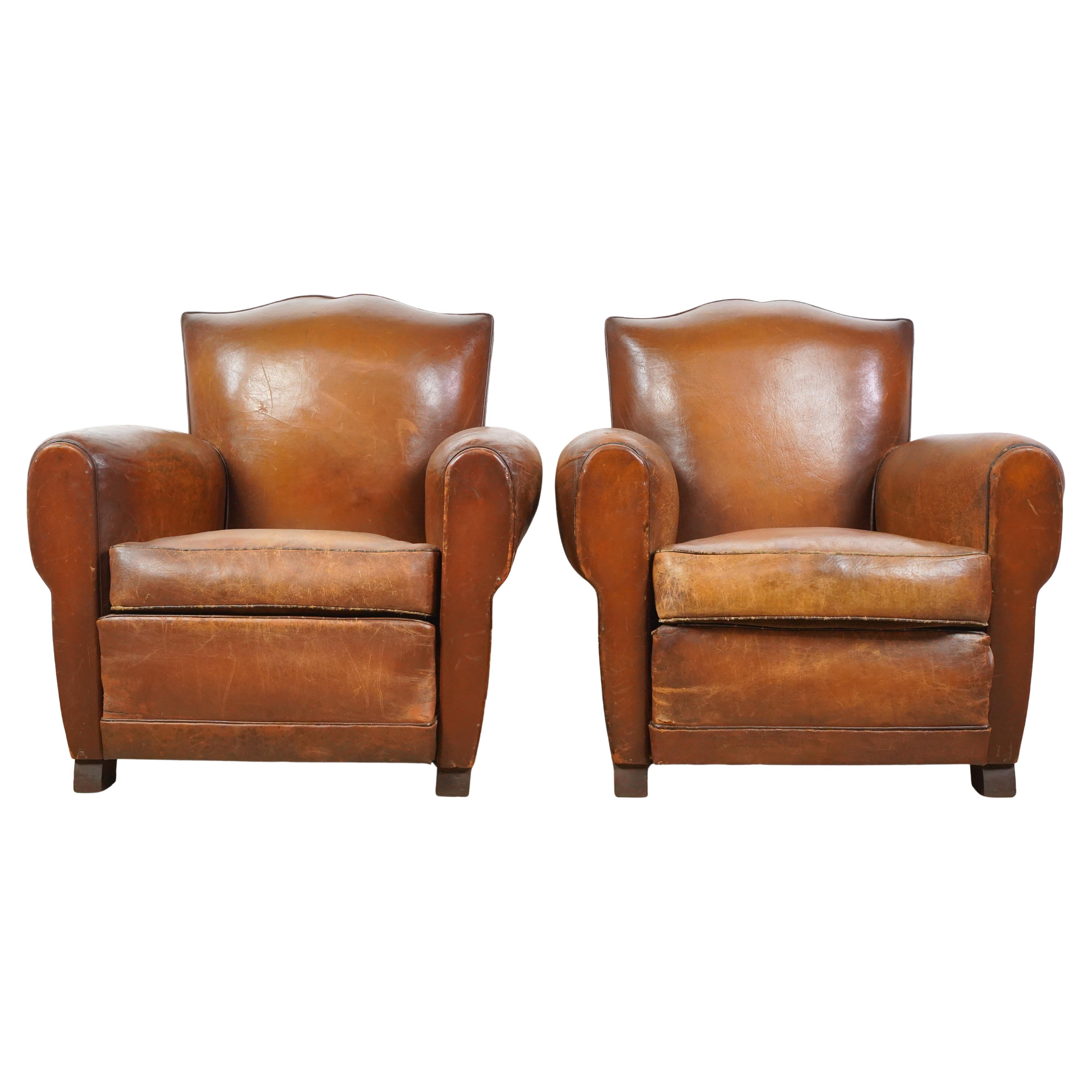 Pair of Brown Leather French Moustache Club Chairs