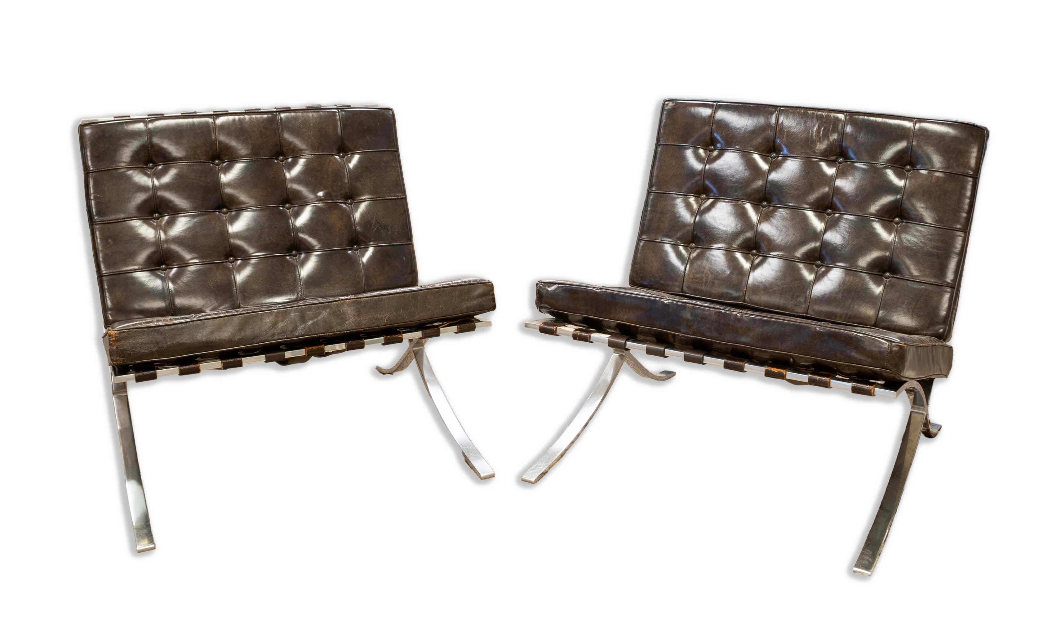 Iconic and timeless, this pair of Brown Leather Knoll Barcelona Chairs by Mies van der Rohe embodies mid-century modern elegance. The sumptuous leather upholstery combined with the sleek, chrome-plated steel frame creates a luxurious and