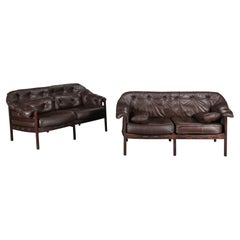 Pair of Brown Leather Loveseats by Arne Norell