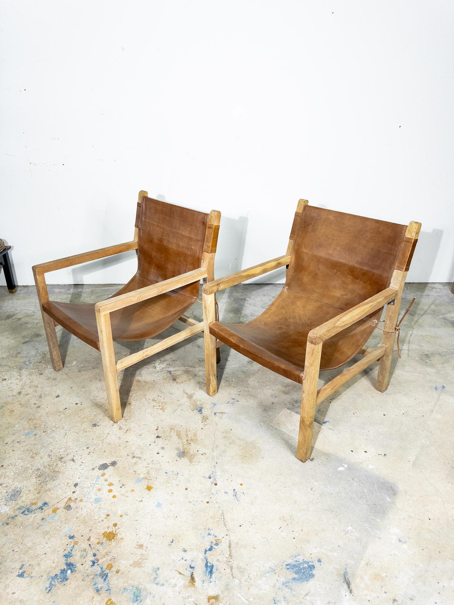 Modern Pair of Brown Leather Sling Chairs with Bleached Wood Arms and Legs