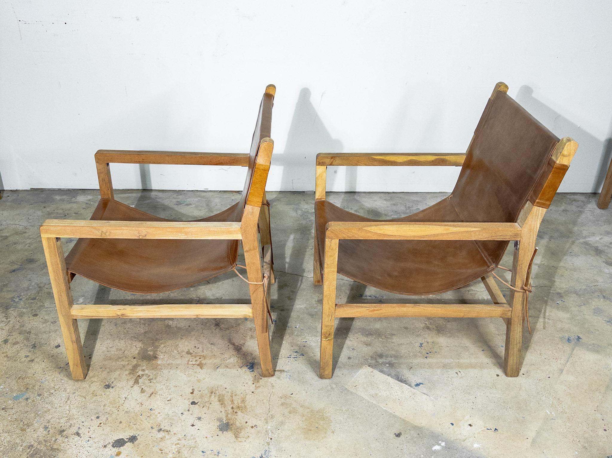 American Pair of Brown Leather Sling Chairs with Bleached Wood Arms and Legs