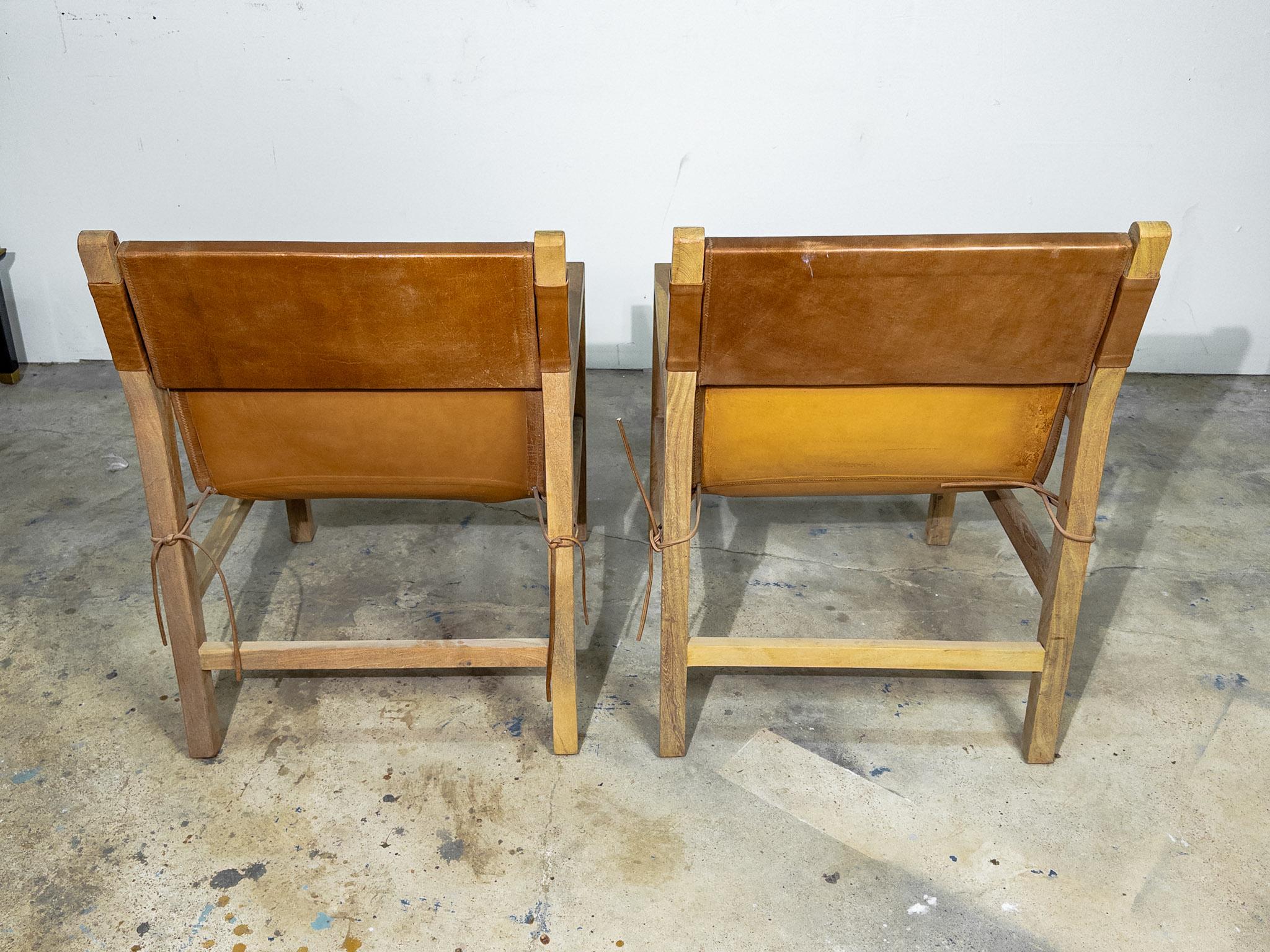 Contemporary Pair of Brown Leather Sling Chairs with Bleached Wood Arms and Legs