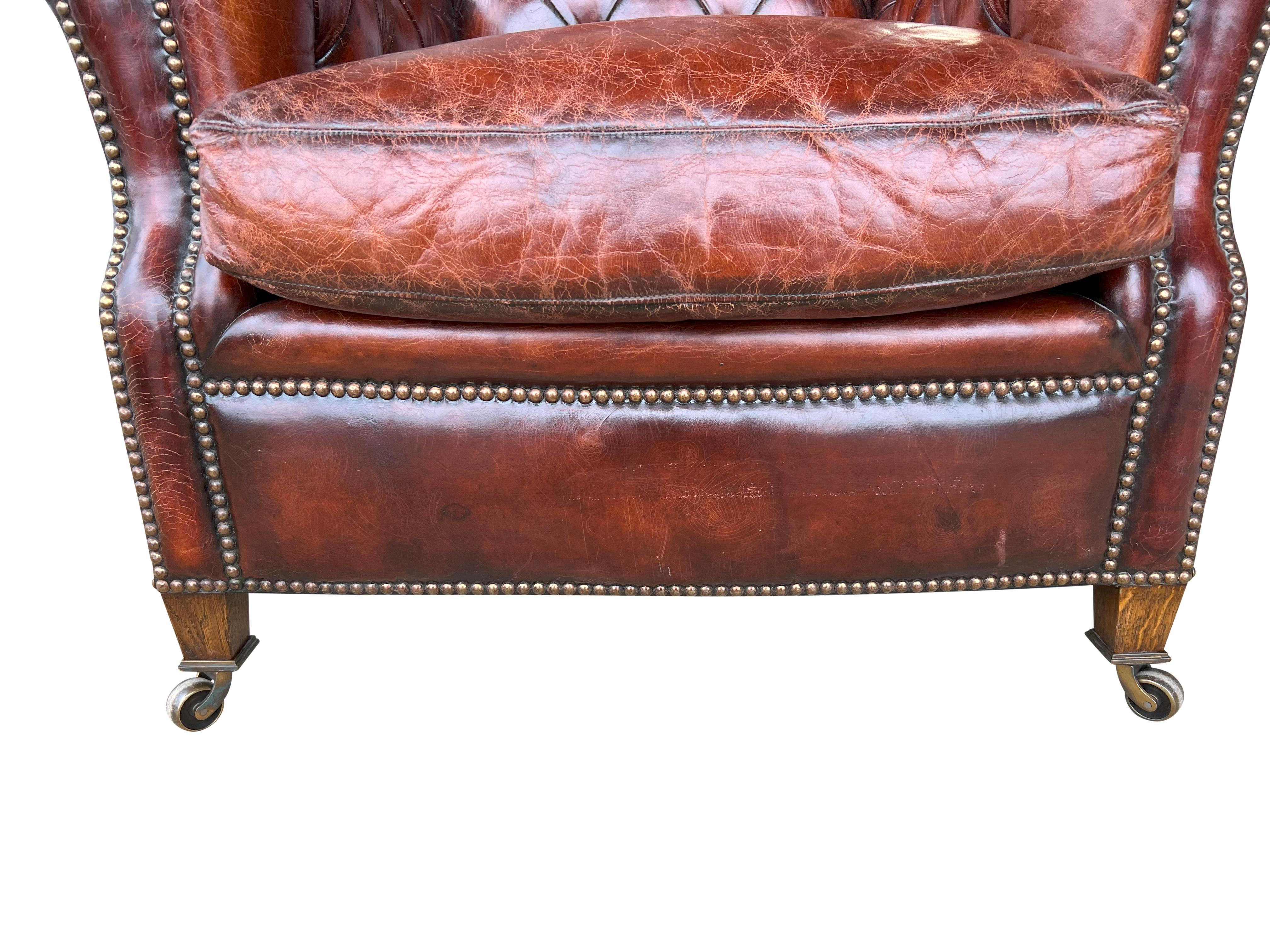 Pair Of Brown Leather Tufted Armchairs For Sale 11