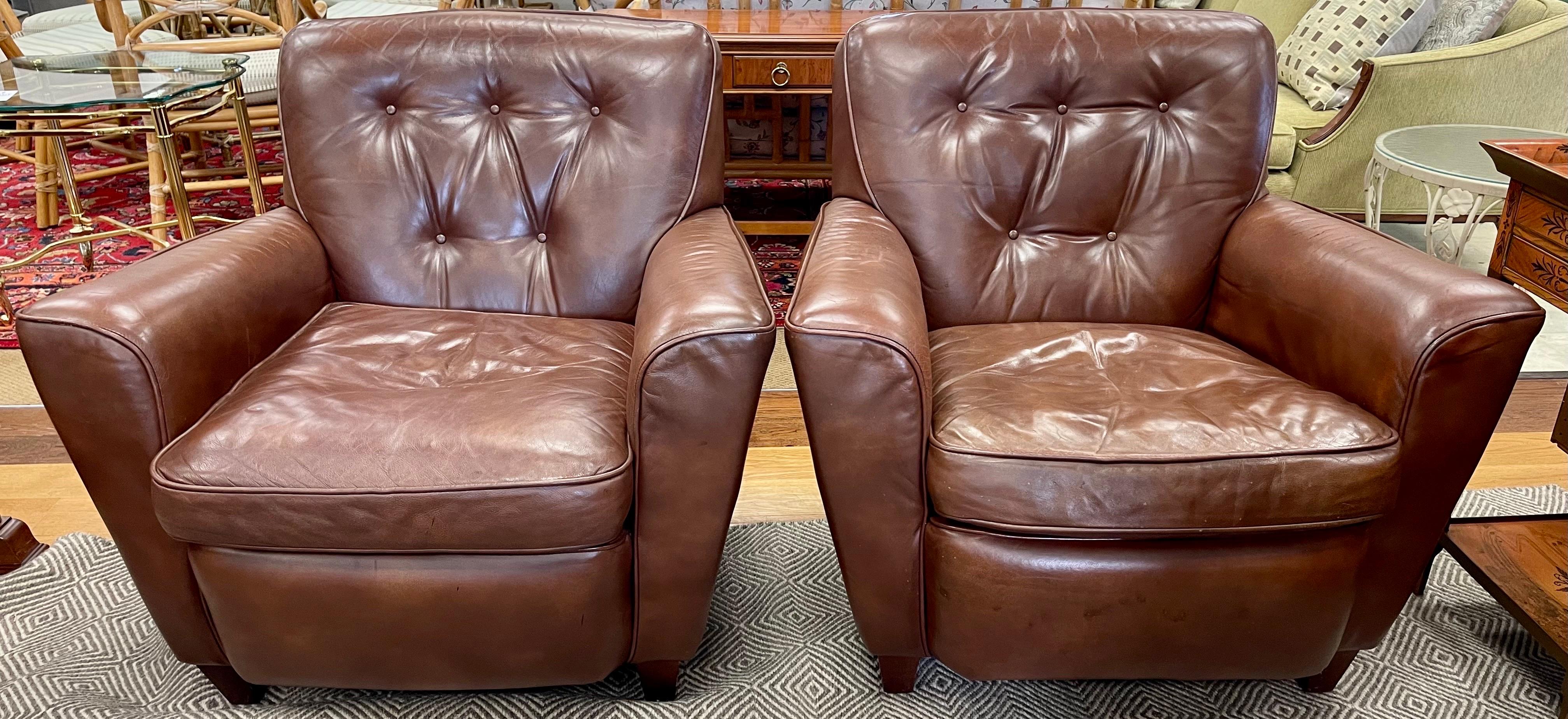 Elegant pair of brown leather club chairs with tufted backs by US leather/furniture company Bradington Young.  Perfect patina, perfect comfort, better lines!
Seat height is 17.5