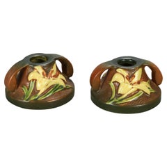 Pair of Brown Roseville Art Pottery Candleholders ith Zephyr Lily Pattern 20thC