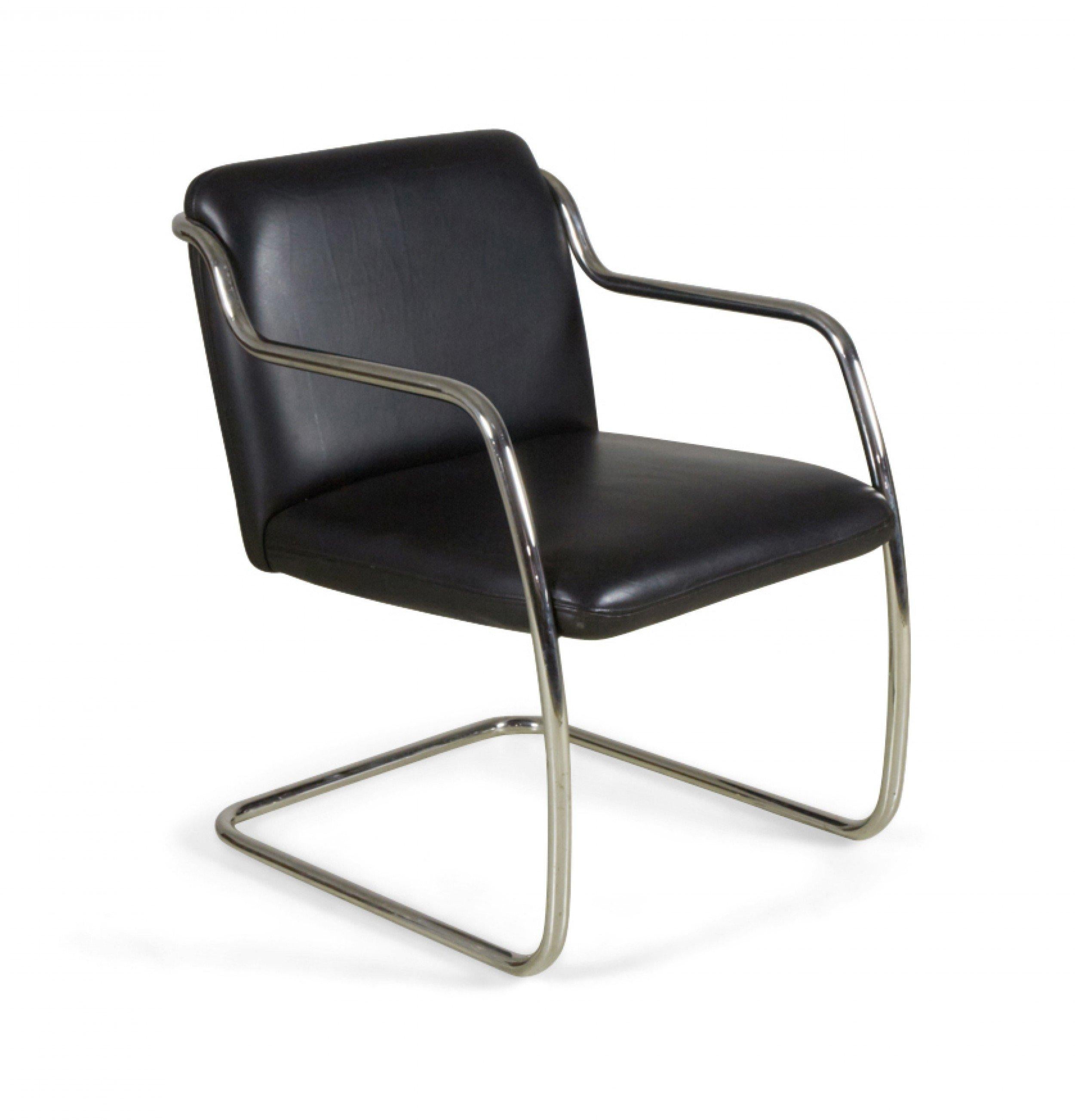 Pair of Contemporary armchairs with silver steel tube frames and black leather upholstery (BRUETON INDUSTRIES)(PRICED AS PAIR).
