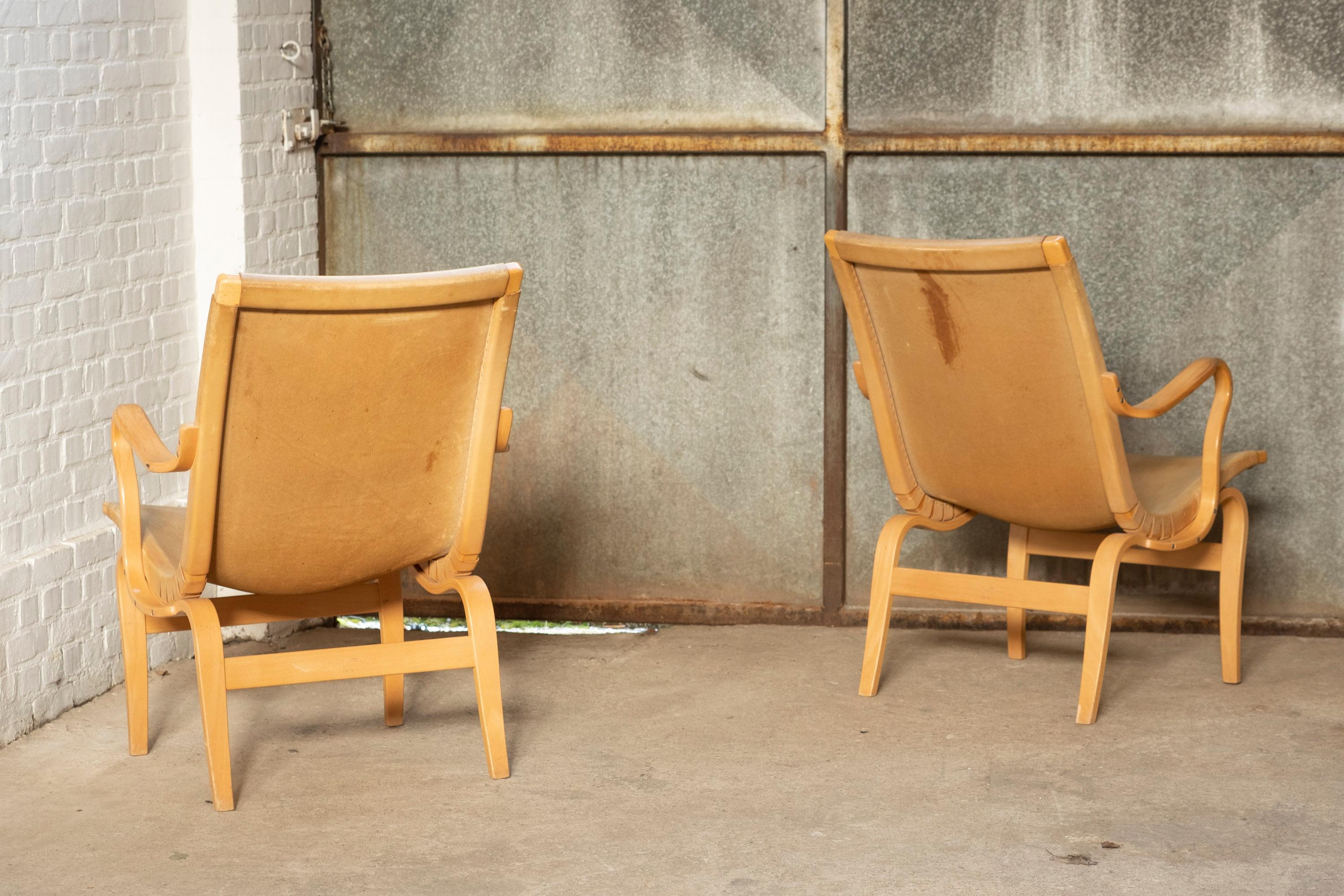 Leather Pair of Bruno Mathsson Eva Lounge Chairs by Dux, Sweden For Sale