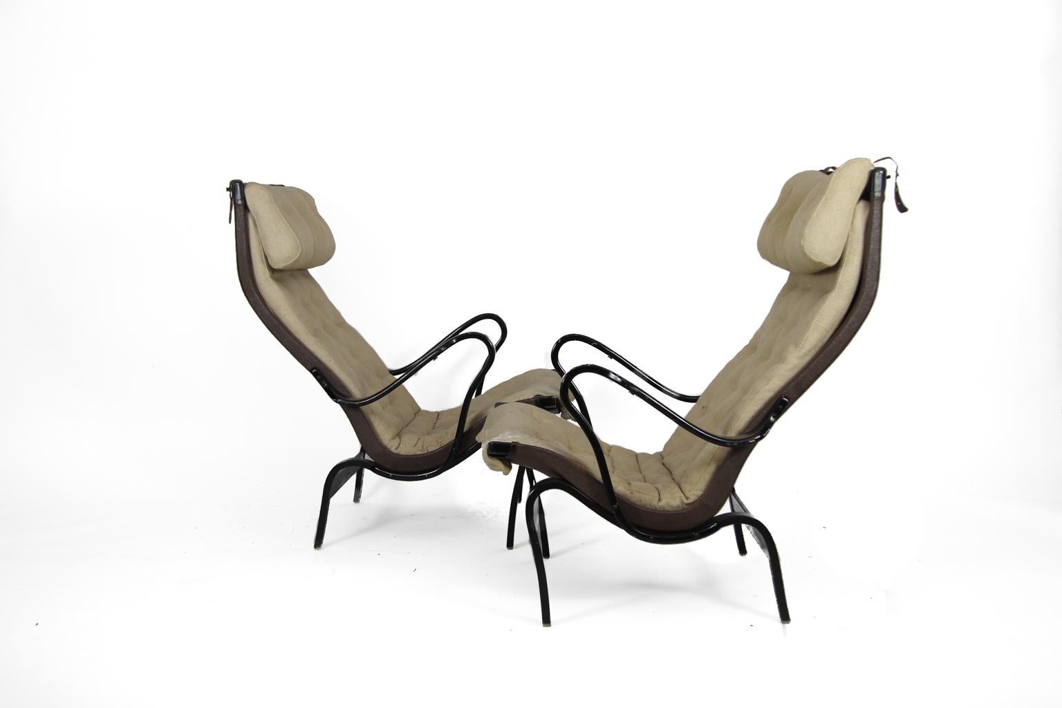 Wonderful pair of two lounge chairs Pernilla in original black, designed by Bruno Mathsson in the 1970s, produced by DUX. All marked under seat. Bases in molded birch and with original upholstery.
Upholstery needs refreshing or made new, price