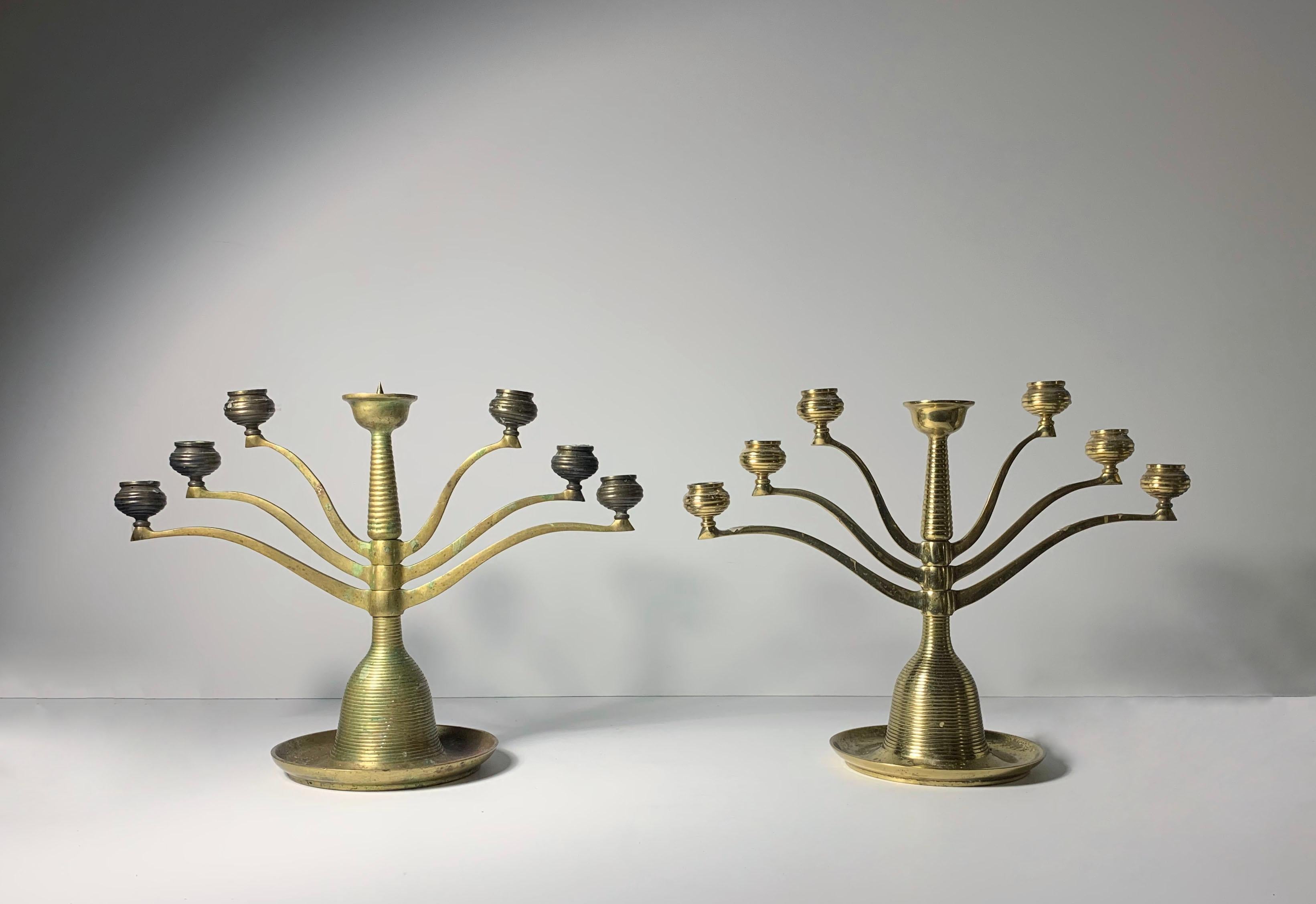 Pair of Bruno Paul Articulating candelabras 
These are unmarked. Uncertain if they are German by Bruno Paul or if possibly by the Anderson Foundry executed in the early 20th century.

Condition is as shown. One is quite clean. The other can use a